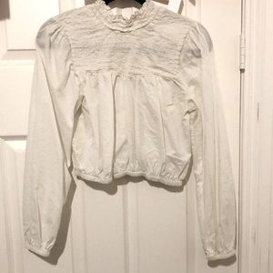 White ruffle blouse